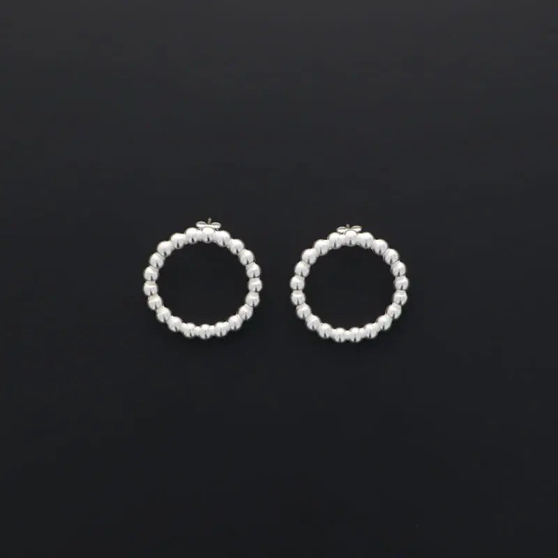 Boucles d'oreilles rond Grand modèle secret de cuir Secret de cuir