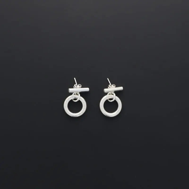 Boucles d'oreilles barre percé Secret de cuir